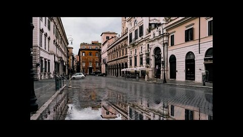 Rainfall on an empty square in the city center of Rome