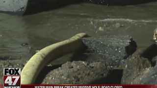 Water main break creates massive hole in Jackson; road closed