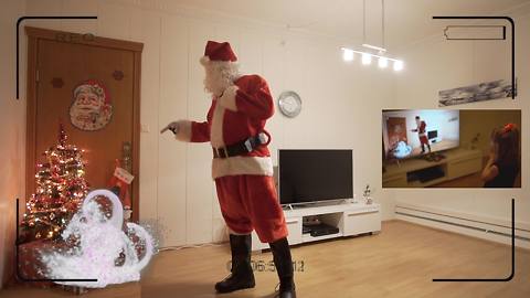 Little girl skeptical of Santa Claus until she sees hidden camera footage