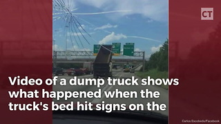 Watch: Dump Truck Driver Hits Wrong Switch... Seconds Later, Interstate in Ruin