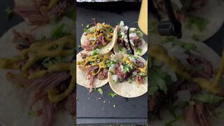 Smoked beef rib tacos with a chipotle lime crema