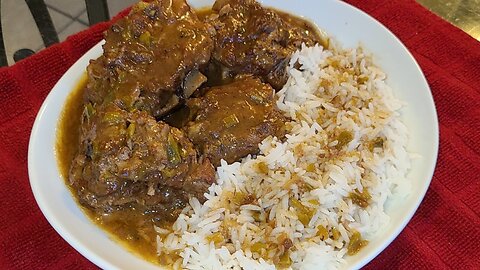 Smoked pork neck bones with rice and gravy