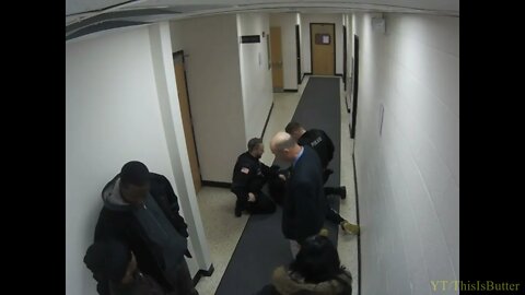 Officer Michael Lewandowski removes man from courtroom