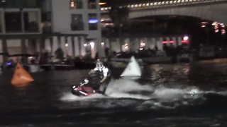 Incredible jet ski back flips performed at night