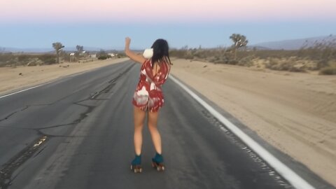 Woman Rollerskates with her Bunny