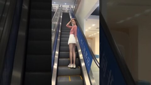Hot Sexy Chinese Girl Rides Up The Escalator