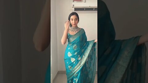 Desi girl with beautiful Red and blue saree dress up with traditional