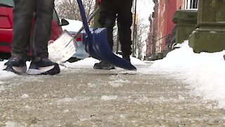 Snow cleanup; Seeing green in all the snow