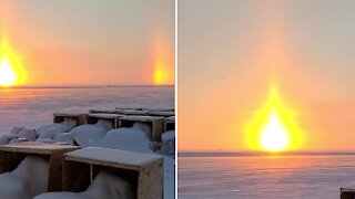 Arctic sunset creates stunning "sun dog" illusion