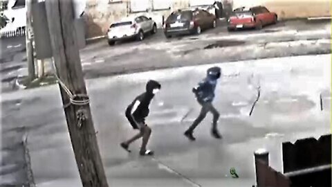 CARJACKING caught on surveillance cameras in broad daylight.