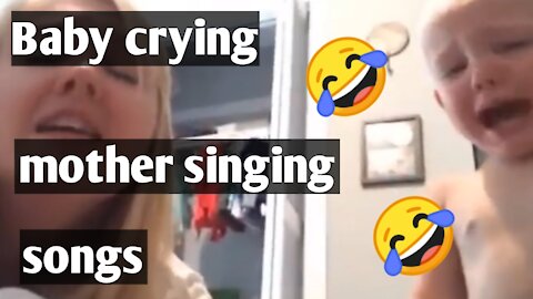 Mother is singing while baby is crying 😂