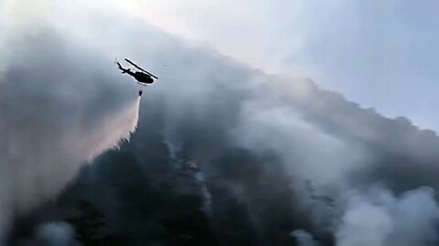 PAF Huey Helicopters help put out Fires in Benguet
