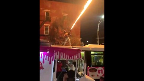 Man Shoots Flamethrower From Top of NYC Bus.