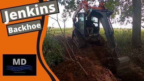 Skidsteer Backhoe from Jenkins Iron and Steel