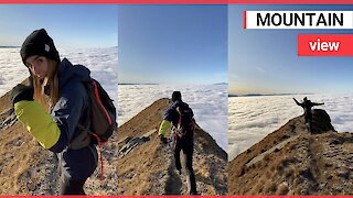 Travel junkie appears to be running the clouds within an Italian mountain range