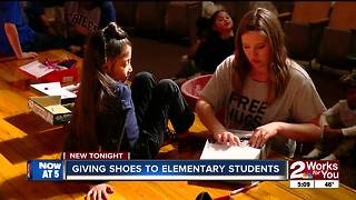 Free shoes given to 600 elementary students