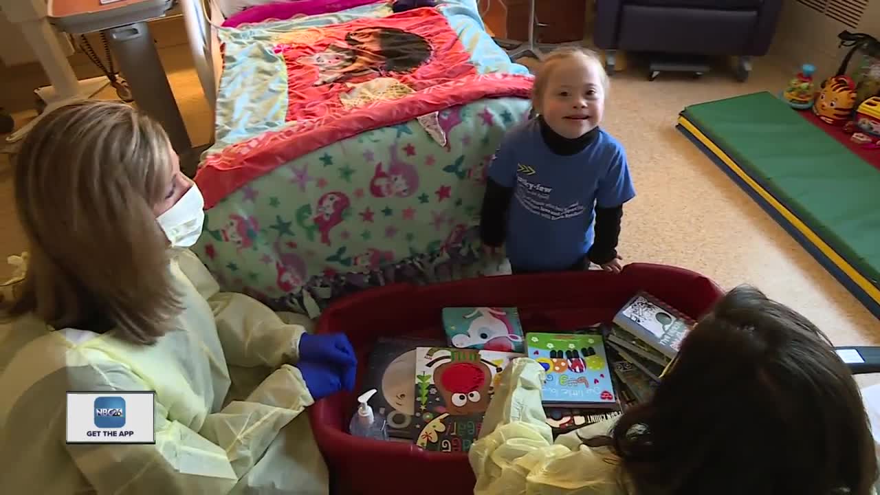 Children at local hospital are surprised with hundreds of new books