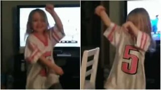 Mini Eagles fan does a victory dance
