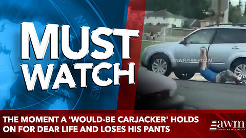 The moment a 'would-be carjacker' holds on for dear life and loses his pants