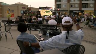 Fans cheer on the Bucks, from the Deer District to the suburbs