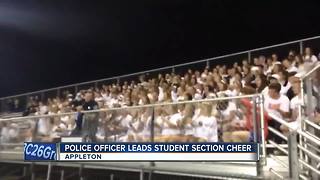 Appleton Police Officer leads student cheer