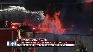 Firefighters battle two-alarm fire at town homes in Tampa