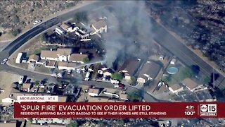 Some residents arrive back to their homes after the Spur Fire in Bagdad, AZ