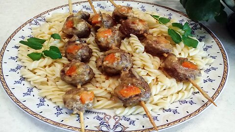 Pasta with grilled meat roll and mozzarella cheese