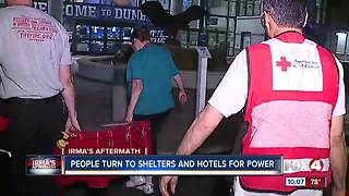 People Turn to Shelters and Hotels for Power