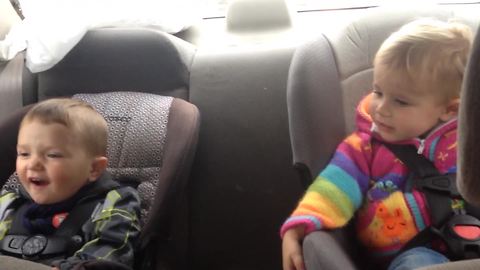 Tot Boy Lip Syncs And Dances In His Car Seat