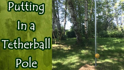 Putting in a Tether Ball Pole at Rain Country Retreat