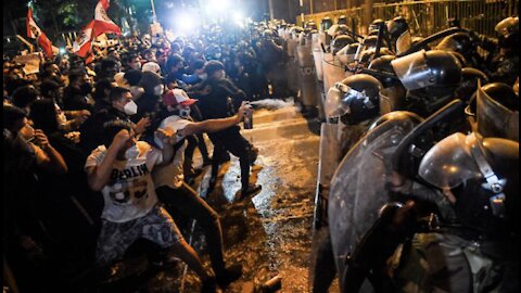 Dozens wounded in Peru as protesters and police clash amid political crisis