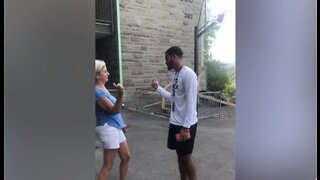 Mother-son handshake goes viral