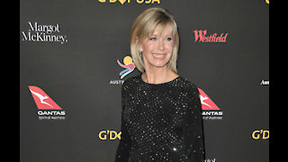 Olivia Newton-John felt 'nervous' before kissing John Travolta