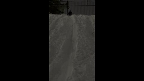 Snowsliding on snow day in Abbotsford, BC. Canada