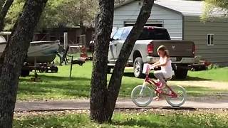 Little Girl On A Bike Crashes Into Tree