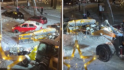 Snowplow gives a gentle push to a car stuck in a snow in Montreal