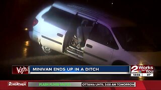Minivan ends up in a ditch