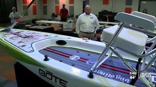 Veteran injured on active duty receives custom made paddle board