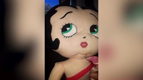 A Young Boy Gets Scared By A Betty Boop Doll