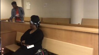 UPDATE 1 - Portia Sizani dressed in Gucci pays her bail after fraud conviction (H9w)