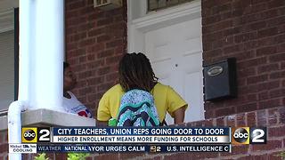 Baltimore teachers hit the streets to raise enrollment