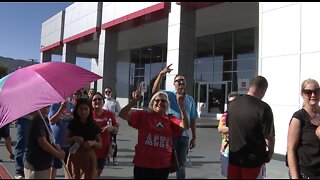 Fans wait in line for hours to get their Aces championship merchandise before Las Vegas Strip parade