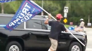 Biden Is Greeted By Huge Trump 2024 Flag & Let's Go Brandon Chants