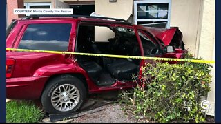 SUV crashes into condo, injuring 2