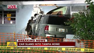 SUV plows through wall of Tampa home