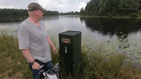 Refilling the Texas Fish feeder with Optimal bluegill