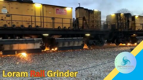 "Loram Rail Grinder: A Unique Under-Train View Experience!"