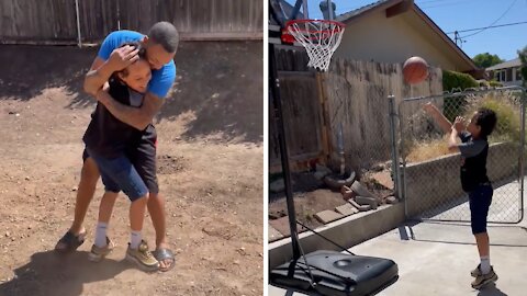 Dad surprises son with his very own basketball hoop