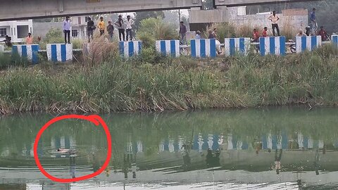 Rescue of a woman who jumped in the canal for suicide.